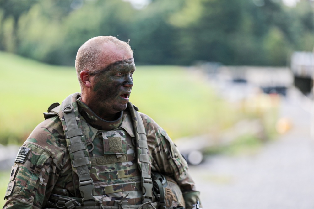 Lt. Col. Keith Benoit Wears Camouflage Face Paint During an Aerial Gunnery