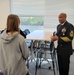 Navy leader visits alma mater, local schools during outreach