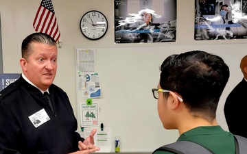 Navy leader visits alma mater, local schools during outreach