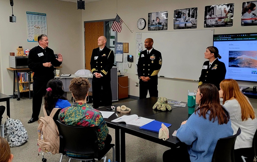 Navy leader visits alma mater, local schools during outreach