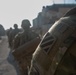 Soldiers patrol through Syria