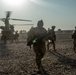 Soldiers depart a CH-47 Chinook in Northeast Syria