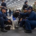 USS Ronald Reagan (CVN 76) welcomes therapy dogs from Love on a Leash