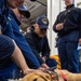 USS Ronald Reagan (CVN 76) welcomes therapy dogs from Love on a Leash