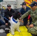 USS Ronald Reagan (CVN 76) welcomes therapy dogs from Love on a Leash