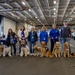 USS Ronald Reagan (CVN 76) welcomes therapy dogs from Love on a Leash