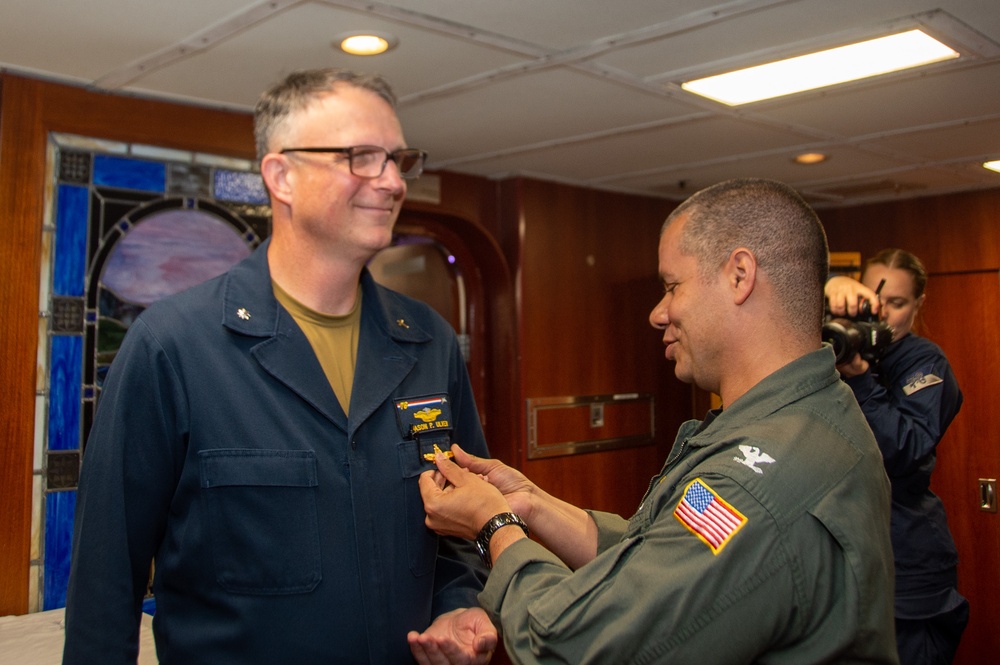 USS Ronald Reagan (CVN 76) Chaplains receive the Surface Chaplain Officer pin