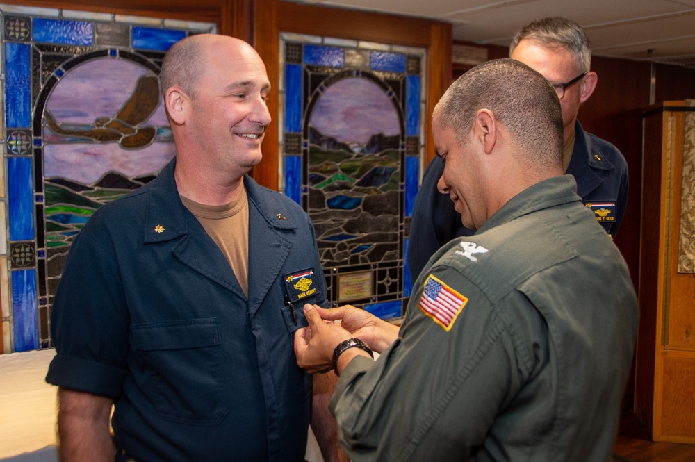 USS Ronald Reagan (CVN 76) Chaplains receive the Surface Chaplain Officer pin