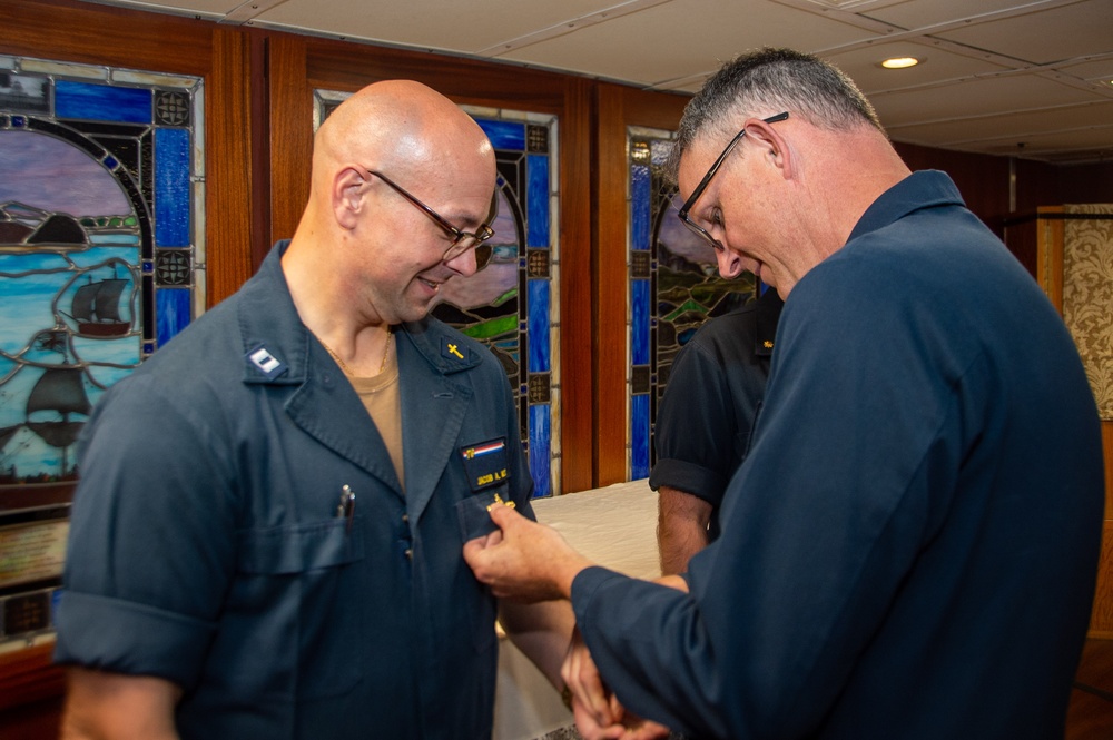 USS Ronald Reagan (CVN 76) Chaplains receive the Surface Chaplain Officer pin