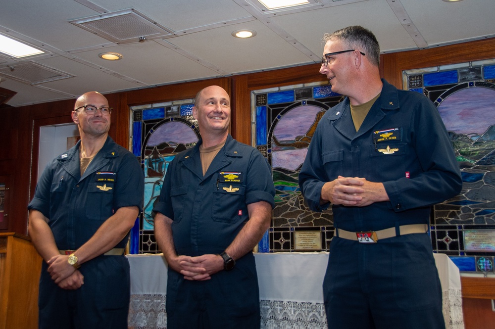 USS Ronald Reagan (CVN 76) Chaplains receive the Surface Chaplain Officer pin