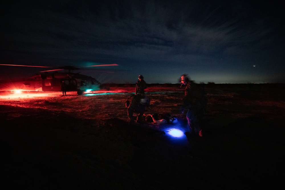 Naval Aircrewmen Execute a Practice Search and Rescue Operation