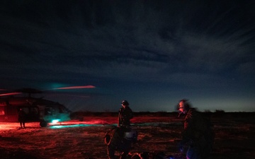 Naval Aircrewmen Execute a Practice Search and Rescue Operation