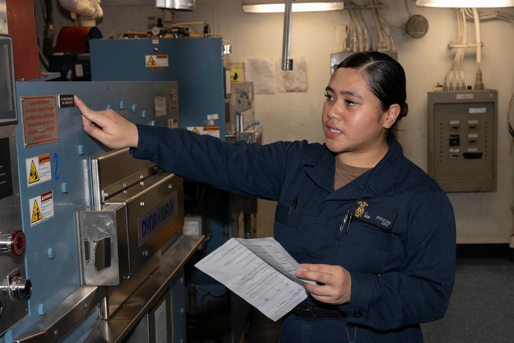 Sailors Conduct Maintenance in Ship's Laundry