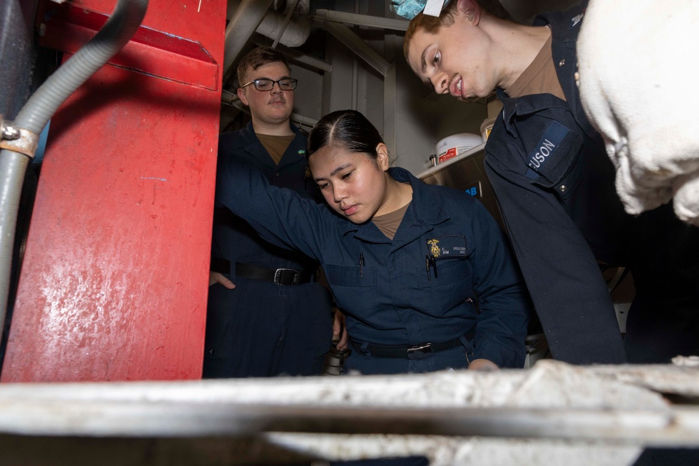 Sailors Conduct Maintenance in Ship's Laundry