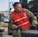 Senior Master Sgt. Aaron Christensen fixes a frustrated pallet