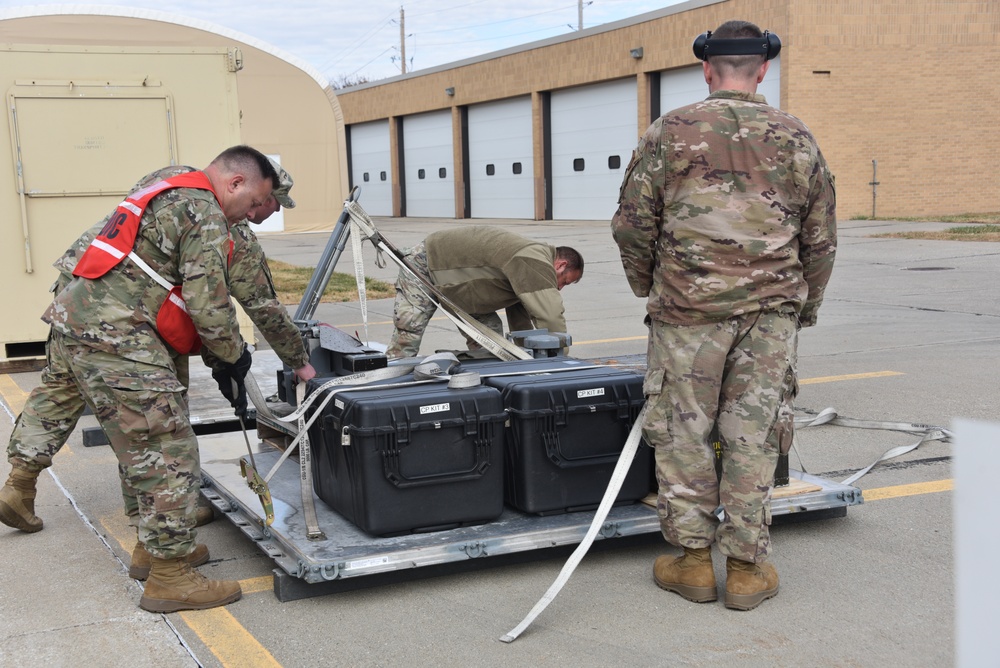 185th Air Refueling Wing Transportation Airmen fix a frustrated pallet