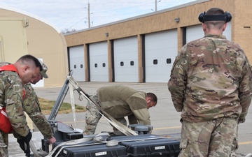 185th Air Refueling Wing Transportation Airmen fix a frustrated pallet