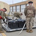 185th Air Refueling Wing Transportation Airmen fix a frustrated pallet