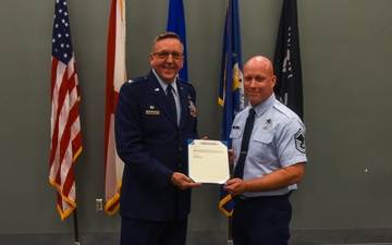 SMSGT Smith is promoted in a ceremony