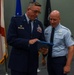 SMSGT Smith is promoted in a ceremony