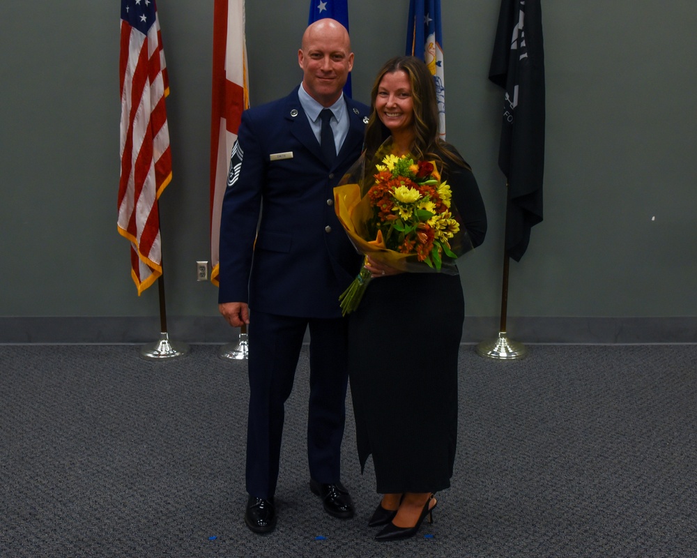 SMSGT Smith is promoted in a ceremony