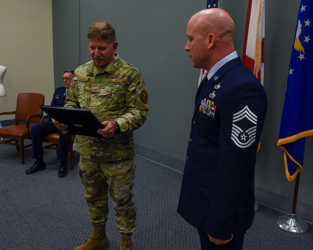 SMSGT Smith is promoted in a ceremony