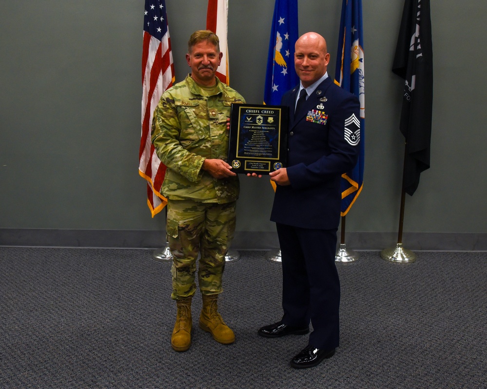 SMSGT Smith is promoted in a ceremony