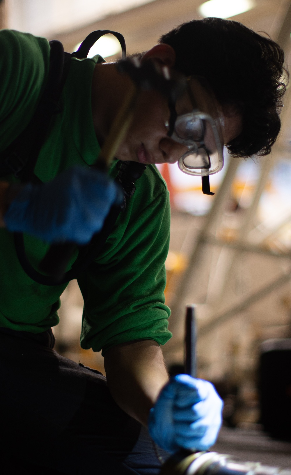 AIMD Sailors assemble aircraft axle jack aboard USS George Washington