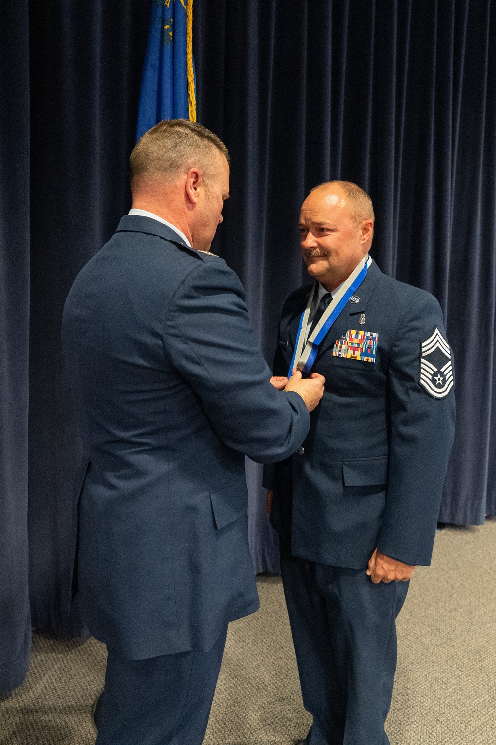 Chief Master Sgt. Jason Farnsworth is awarded the Chief Master Sgt. Jason Farnsworth is awarded the Major General Drennan A. Clark Order of Nevada medal