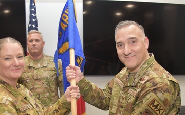 Col. Chad Schoonover accepts 185th ARW guidon