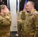 Col. Chad Schoonover salutes 185th ARW Commander Col. Sonya Morrison