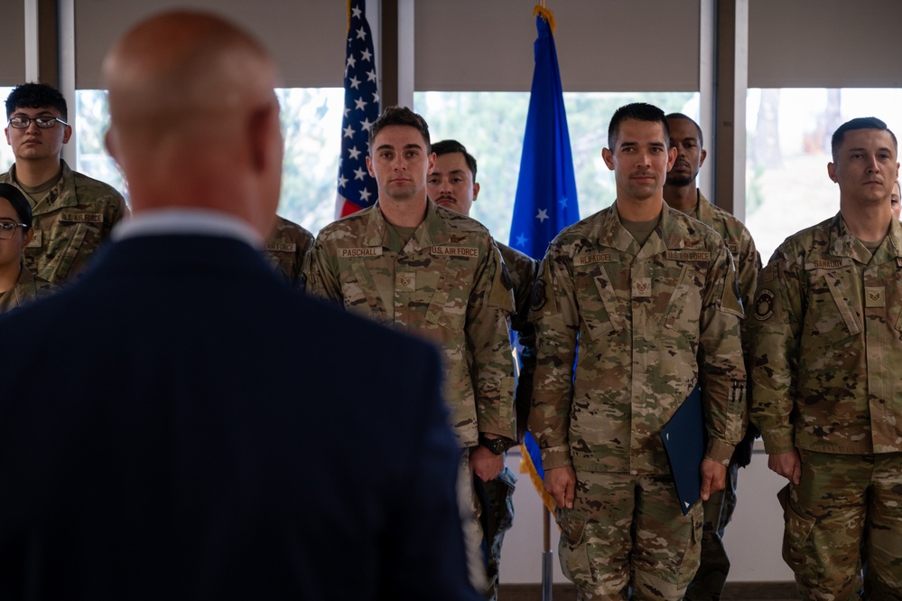 310th SW holds induction ceremony for new SNCOs, NCOs