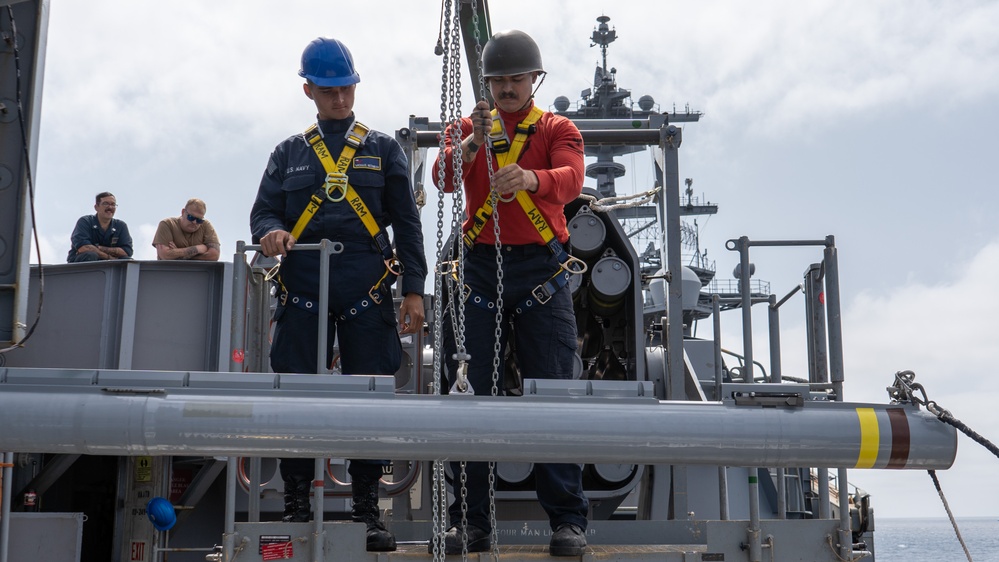 USS George Washington Sailors download rolling airframe missiles