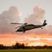 HSC-12 flies during sunset in Guam