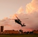 HSC-12 flies during sunset in Guam