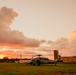 HSC-12 flies during sunset in Guam