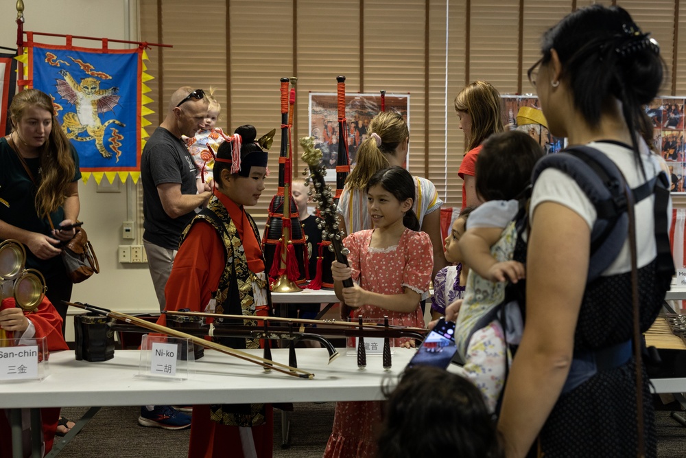 Shuri Castle Uzagaku Rojigaku Performance Group Plays for Service Members and Their Families on Camp Courtney