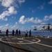 USS Ralph Johnson Conducts A Helicopter in-flight Refueling Exercise.