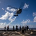 USS Ralph Johnson Conducts A Helicopter in-flight Refueling Exercise.