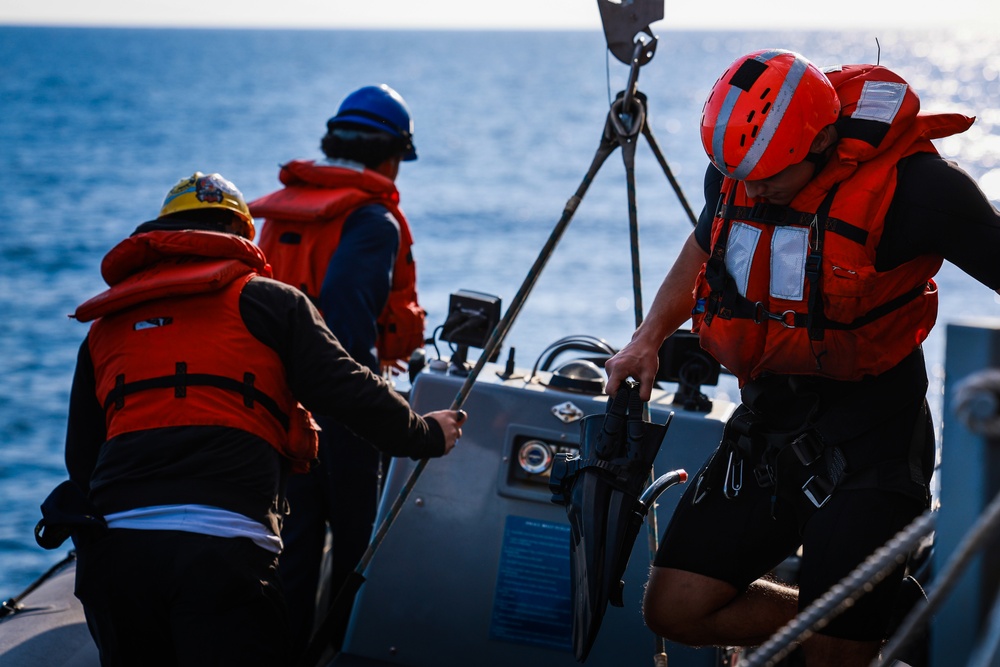 The USS Bulkeley conducts Boat Operations and PAX Transfer
