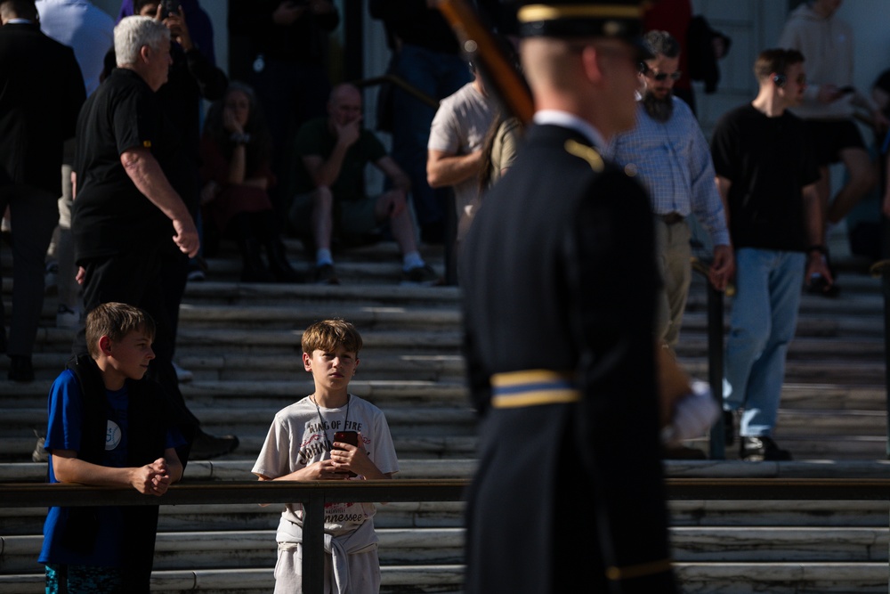 Bystander Observes Soldier at Tomb