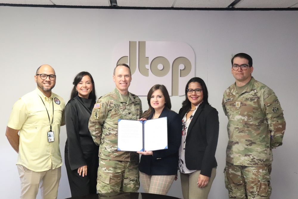 USACE Caribbean District members with Secretary Eileen Vélez, from the Puerto Rico Department of Transportation and Public Works during the Project Partnership Agreement for the Río Grande de Manatí Flood Risk Management in Ciales