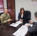 A Puerto Rico Department of Transportation and Public Works lawyer stamps the Project Partnership Agreement for the Río Grande de Manatí Flood Risk Management Project in Ciales