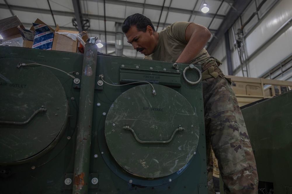 Mechanic Works on Air Conditioner