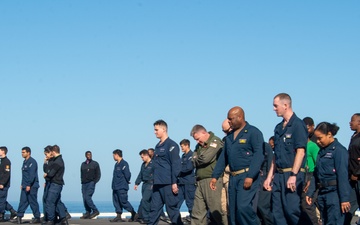 USS Ronald Reagan (CVN 76) Sailors conduct a FOD walk down