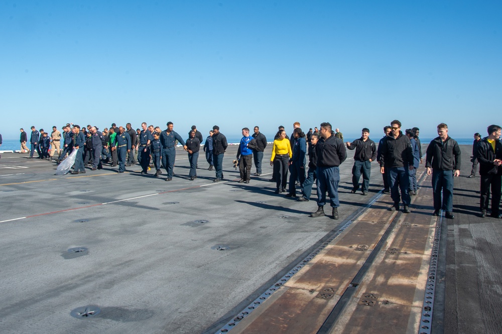 USS Ronald Reagan (CVN 76) Sailors conduct a FOD walk down