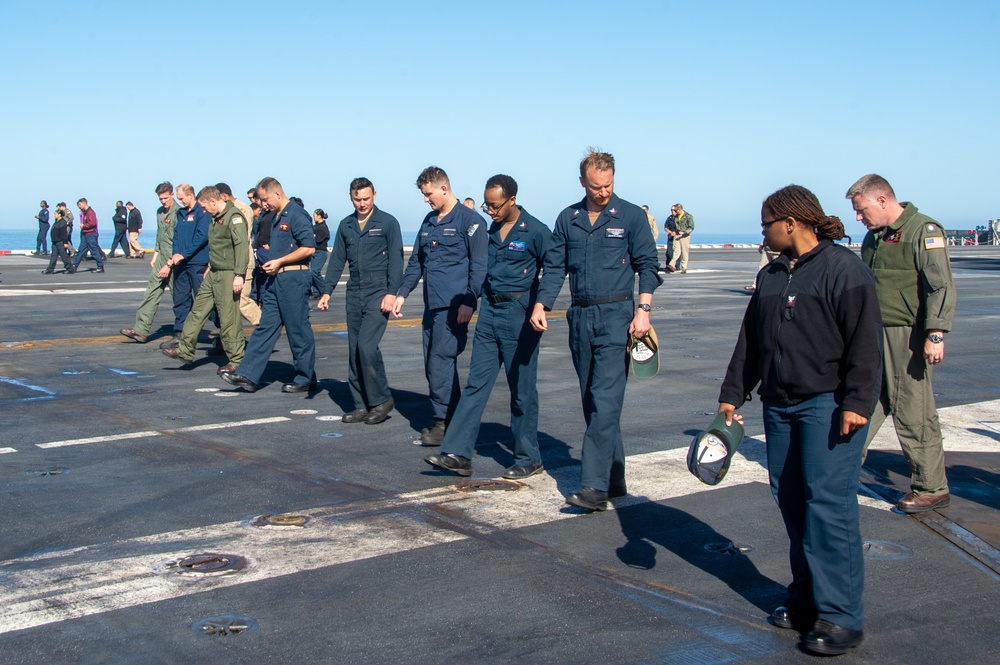 USS Ronald Reagan (CVN 76) Sailors conduct a FOD walk down