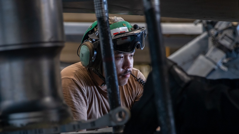 HSM-77 Sailors Maintain Aircraft Aboard USS George Washington