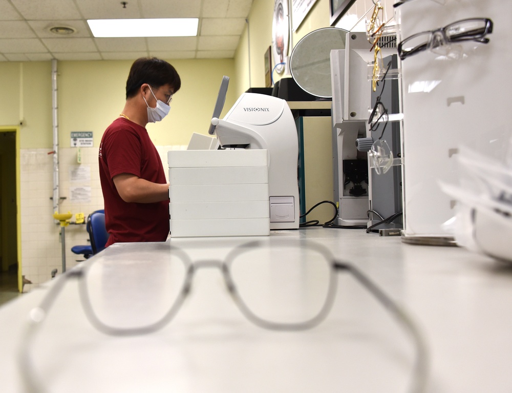 Working in USAMMC-K optical lab