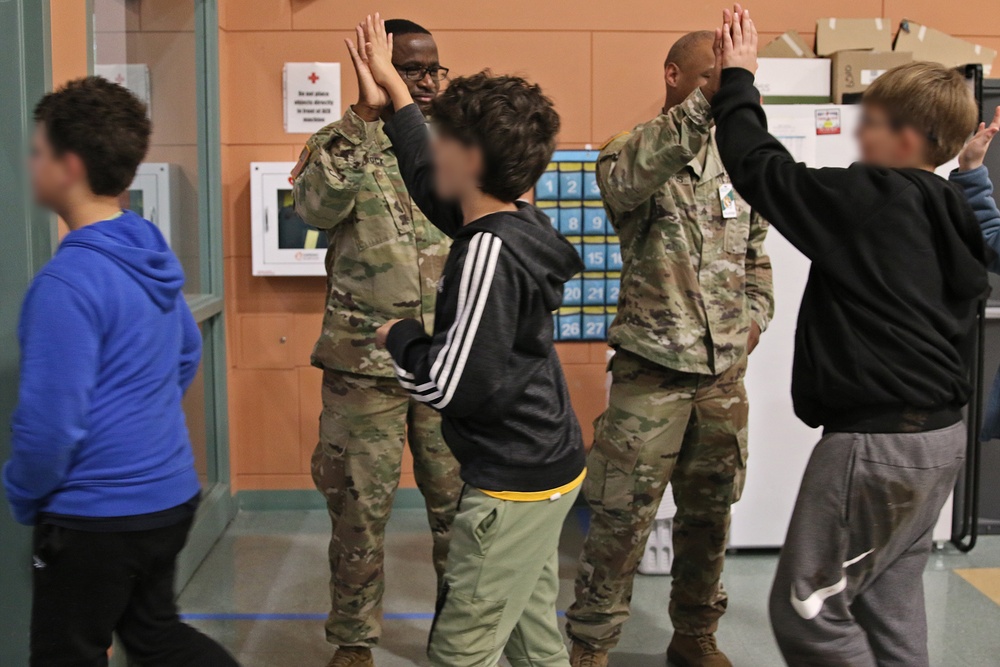 593d ESC Unit Ministry Team Joins Thompson Elementary Students for Dia De Los Muertos Lunch